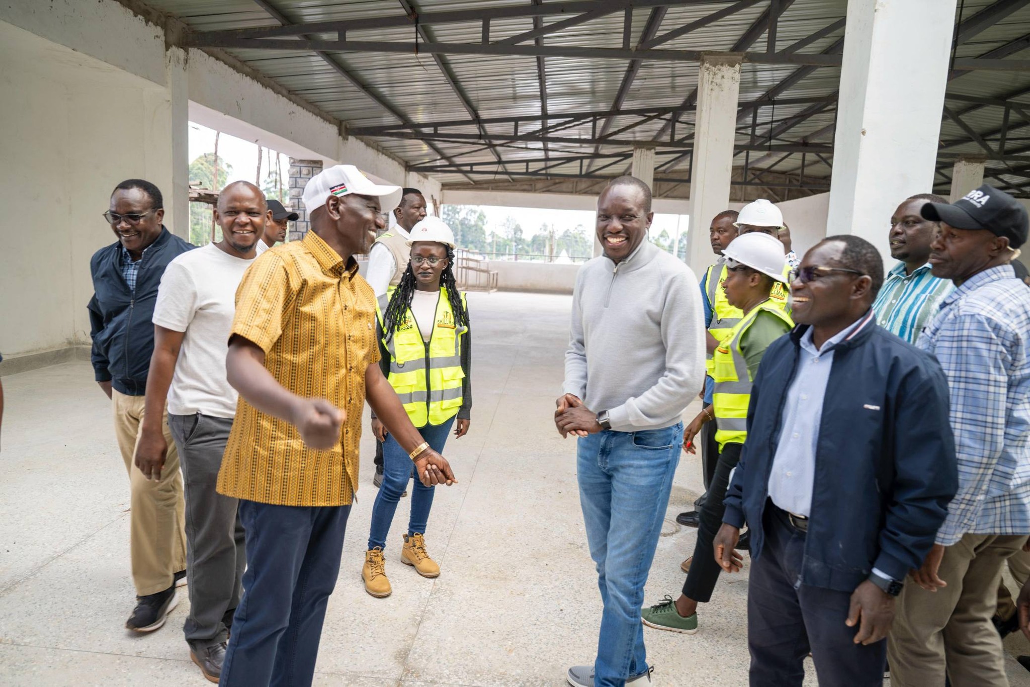 H.E President Dr William Ruto has a light moment with PS Stephen Isaboke and other senior Government officials during the Presidential Development Tour of Gusii