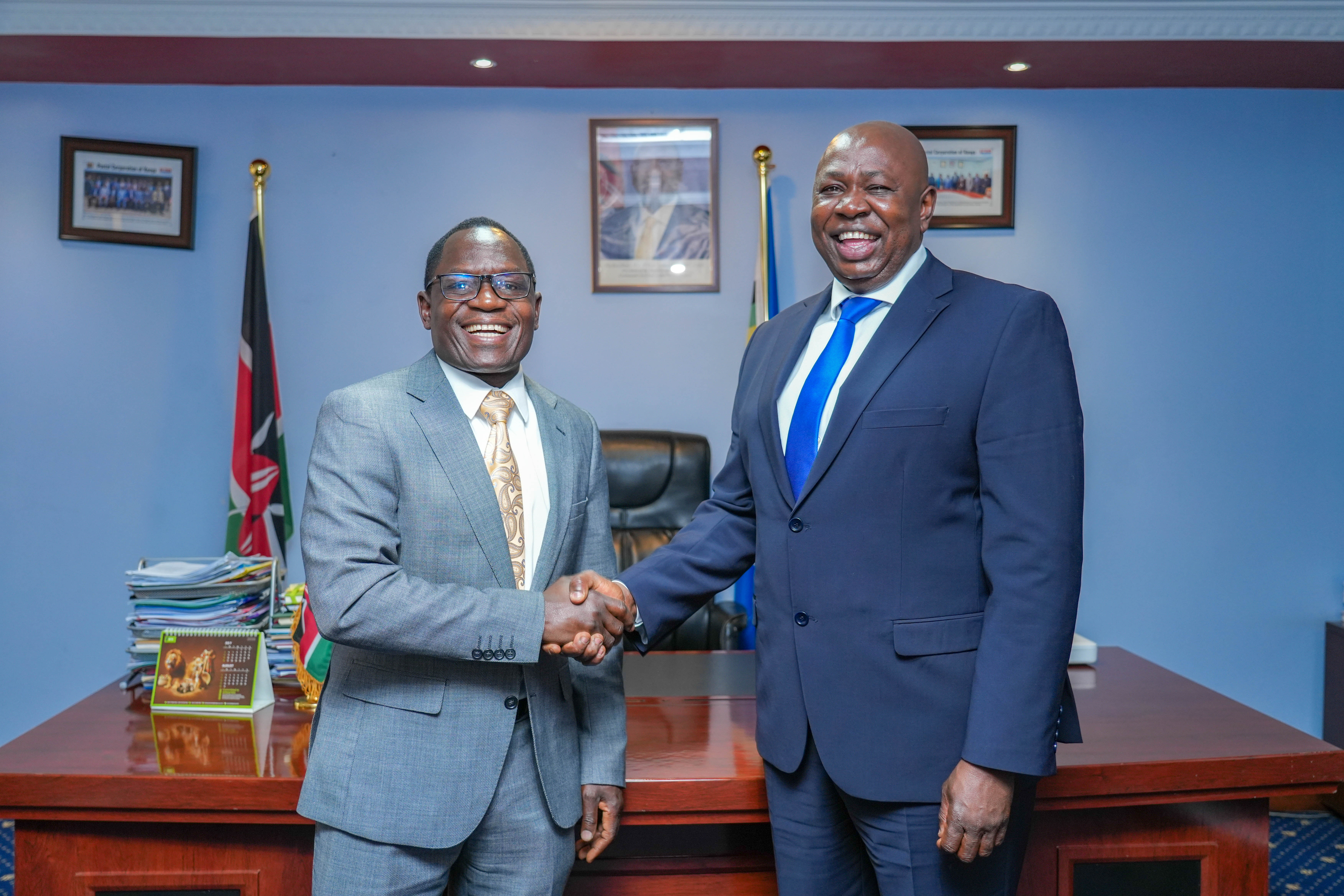 PS Stephen Isaboke, EBS, (left) and newly appointed Government Spokesperson, Mr Charles Owino (right)
